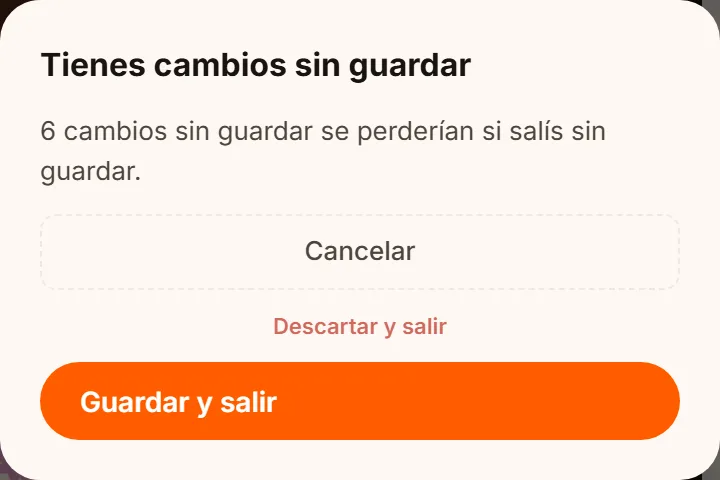 El aviso «Tienes cambios sin guardar» con los botones Cancelar, Descartar y salir, y Guardar y salir.